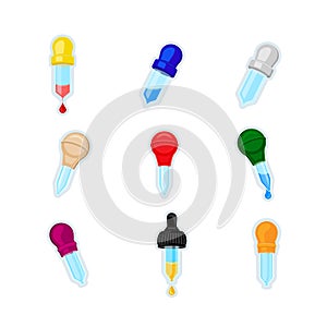 Pipette Icon. Set of different colors pipettes with blood, water or oil isolated photo