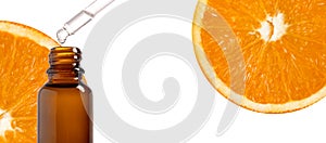 Pipette with organic citrus oil and orange slices on white background. Wide web site banner. Cosmetic product banner