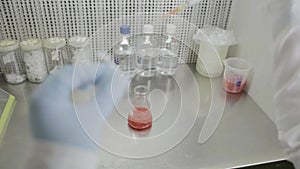 Pipetting solutions in a genetic laboratory at university