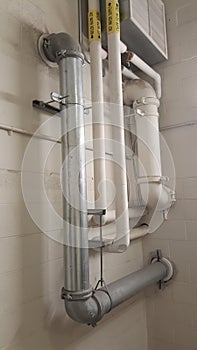 Piping And Ducting On A Building wall