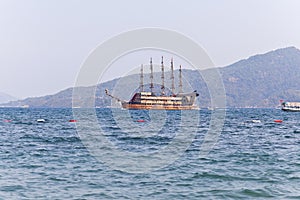 Pirat toat in a calm bay. Aegean Sea. Turkey photo