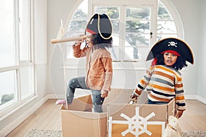 Pirate, box and games with children in living room for playful, creative and imagine. Fantasy, relax and party with kids