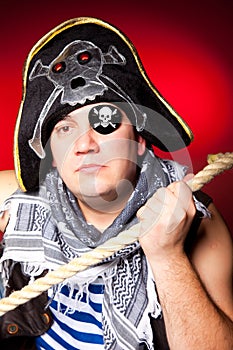 Pirate with a cocked hat and a rope