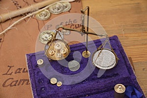 Pirate coins being weighed