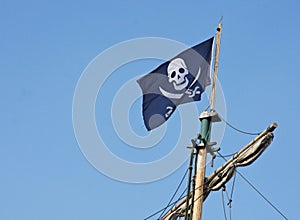 Pirate flag that flies above the Corsair ship photo
