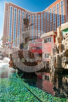 pirate ship in the bay of the Treasure Island hotel on the main street of Las Vegas - the Strip. Sunny day and clear cloudless sky