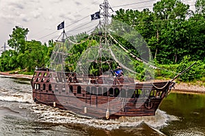 A pirate ship cruising on the Mississippi River