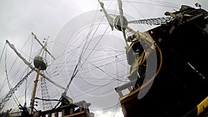 Pirate ship in a storm in a port