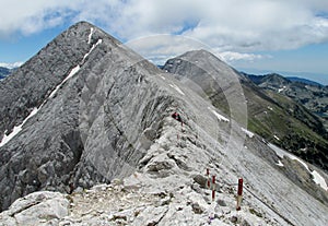 Pirin mountains in Bulgaria, gray rock summit during the sunny day with clear blue sky