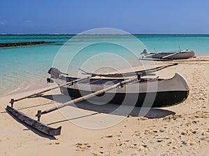 Pirogue moored on white sand beach, Nosy Ve island, Indian Ocean, Madagascar