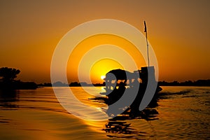 Pirogue at sunset, Mali (Africa).