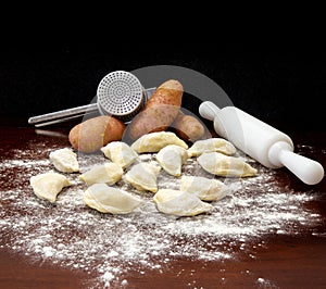 Pirogues, pierogi , Ukrainian food, on wooden table photo