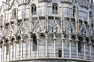 Close-up on exterior facade of catholic Basilica in Pisa