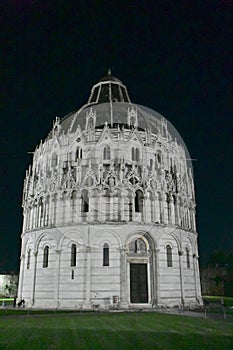 Pisa Baptistery or Battistero di San Giovanni Floodlit at Night, Tuscany, Italy