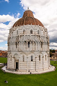 Pisa Baptistery at the Square of Miracles - UNESCO World heritage site. Pisa, Tuscany, Italy