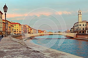 Pisa cityscape with Arno river and Ponte di Mezzo bridge. Tuscany, Italy. photo