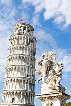 Pisa, Italy - Famous Leaning Tower landmark with blue sky, Renaissance white marble