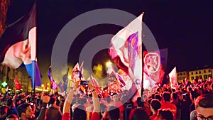 PISA, ITALY - JUNE 15TH, 2016: Local fans celebrate the soccer team's promotion. Celebrations in the night with smoke bombs and a