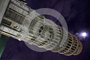 Pisa, the leaning tower by night with moon