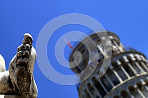 Pisa tower and statue photo