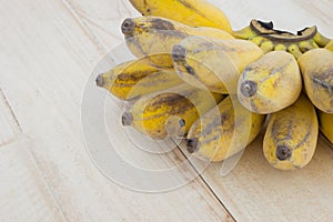 Pisang Awak banana, Kluai Nam Wa, Cultivate banana on wooden background, copyspace