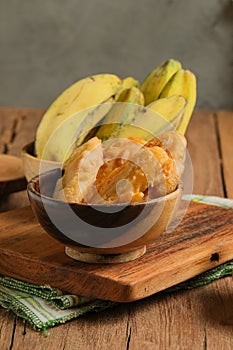 Pisang goreng or Fried Banana served on wooden table