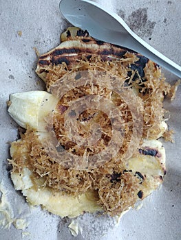 Pisang Kapik one of traditional food in Padang. Minangkabau for grilled banana. An Indonesian traditional dessert roasted banana.