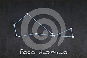 Piscis Austrinus constellation drawn on a blackboard photo