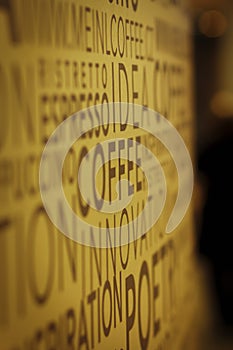 Pismena na stenu and cofe text with blur background