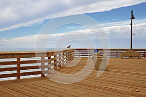 Pismo Beach pier, ocean view, cloudy sky background in an overcast day, California