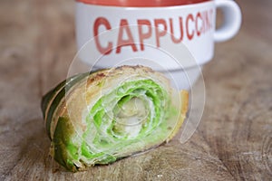 pistachio brioche and hot cappuccino