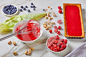 Pistachio ganache tart with raspberry pectin jelly