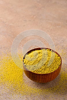 Pistachio gluten free flour in a wooden bowl