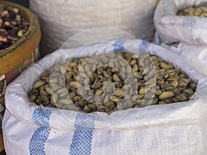 Pistachio nuts in a bag are in a bazaar in Turkey