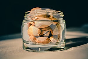 Pistachio nuts in a glass container