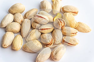 Pistachio nuts isolated on white background. Healthy food and diet snack.