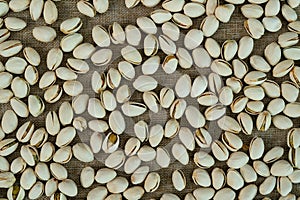 Pistachio nuts on a wooden table. Healthy food high protein