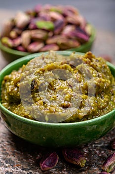 Pistachio pesto sauce made from high quality green pistachio nuts growing on slopes of Mount Etna in Bronte, Sicily, Italy