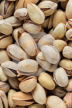 Pistachio texture. Nuts. Green fresh pistachios as texture. Close-up.