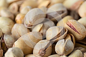 Pistachio texture. Nuts. Green fresh pistachios as texture. Close-up.