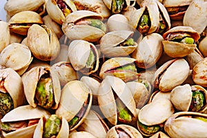 Pistachio texture. Nuts. Green fresh pistachios as texture. Roasted salted pistachio nuts healthy delicious food studio