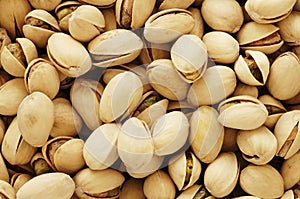 Pistachios nuts close up full frame background