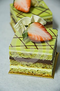 Pistacho layer cake and chocolate garnache