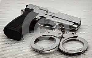 Pistol and handcuffs