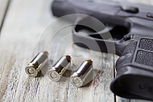 Pistol Handgun and Bullets photo