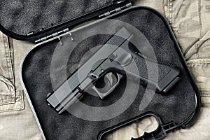 Pistol 9mm, Gun weapon series, Police handgun close-up. photo