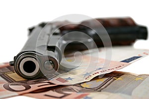 Pistol and money
