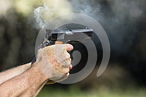 Pistol Smoking After Being Fired