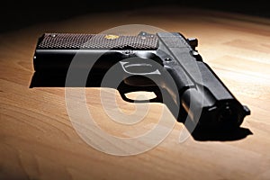 Pistol on the table photo