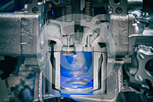 Piston diesel engine at cross section in car. Close up at piston